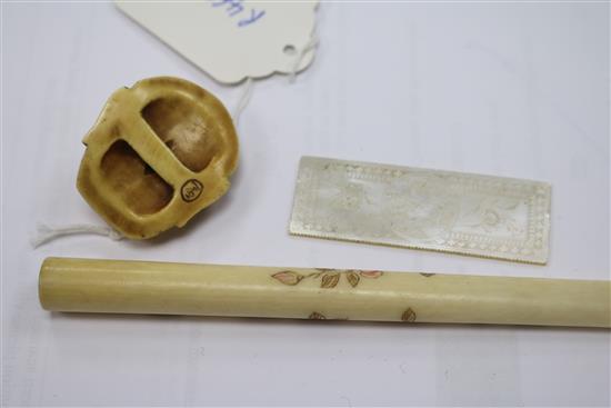 A Shibayama style cheroot holder, a Japanese ivory manju netsuke and a mother of pearl token